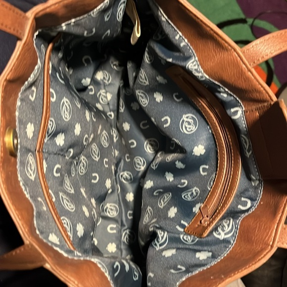 Lucky Brand brown studded purse with cutouts and Teal & horseshoe print lining. - Picture 2 of 8